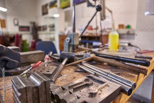 Goldsmith, different kind of tools on workbench