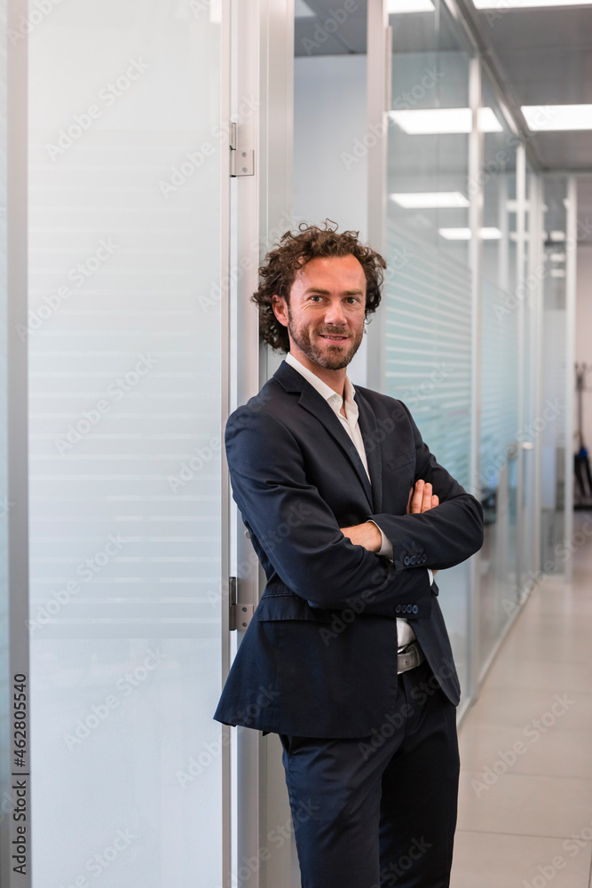 Portrait of confident businessman in office Portrait of confident businessman in office