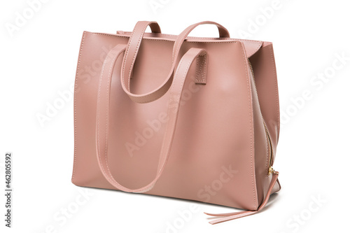 large pink leather ladies bag with long handles, on a white background