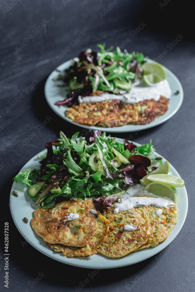 Vegetable cheese fritter with salad on plate Vegetable cheese fritter with salad on plate