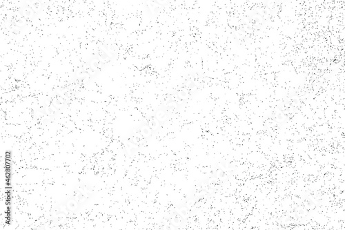 Grunge texture of uneven background randomly dotted with dots. Vector illustration. Overlay template