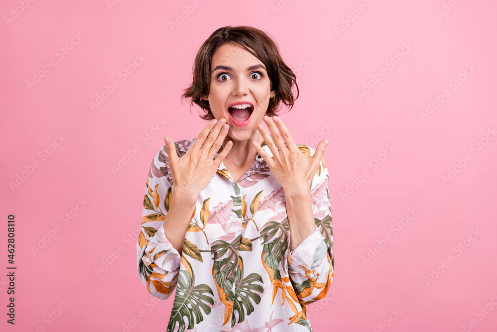 Photo of young girl happy positive smile amazed surprised omg wow news isolated over pink color background