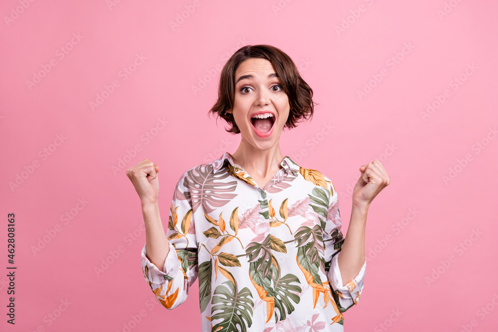 Photo of young girl happy positive smile rejoice win victory lucky success isolated over pink color background Photo of young girl happy positive smile rejoice win victory lucky success isolated over pink color background