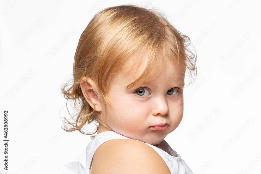Portrait of pouting blond girl, white background Portrait of pouting blond girl, white background