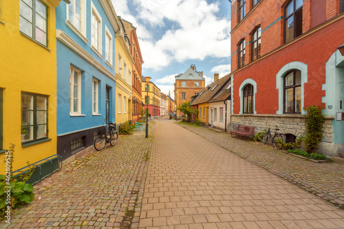 Empty street amidst buildings in Malmo, Sweden photo