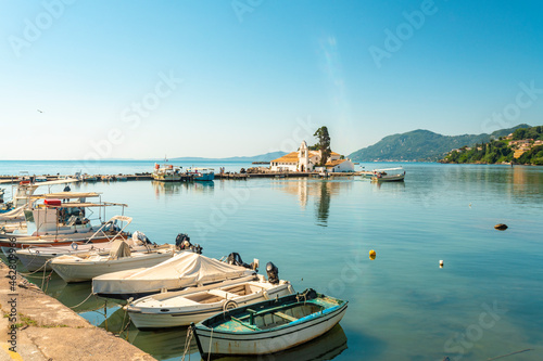 Boats moored at marina against sky at Corfu, Greece photo