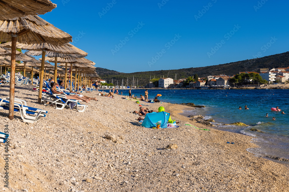 Obraz premium The beach in Primosten town the coast of the Adriatic Sea, Croatia