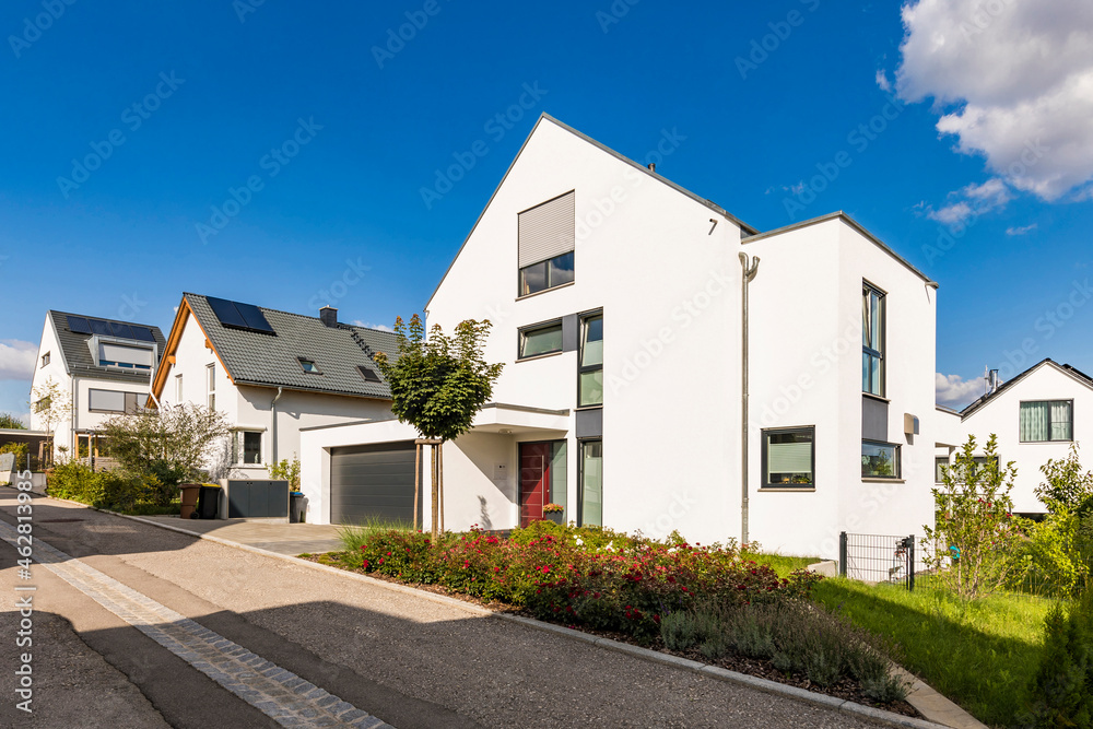 Exterior of residential buildings with solar panels on roof against sky, Baden-WÔøΩrttemberg, Germany Exterior of residential buildings with solar panels on roof against sky, Baden-WÔøΩrttemberg, Germany
