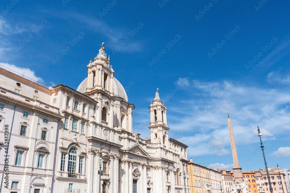 Italy, Rome, Low angle view of Sant Agnese in Agone church with Agonalis obelisk in background Italy, Rome, Low angle view of Sant Agnese in Agone church with Agonalis obelisk in background