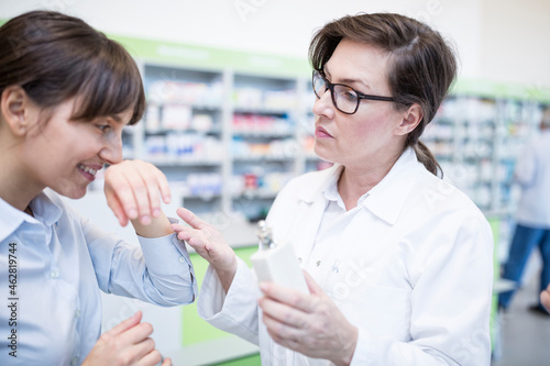Customer testing scent in pharmacy