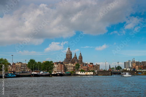 The Netherlands, North Holland Province, Amsterdam, Basilica of Saint Nicholas seen across canal photo