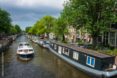 The Netherlands, North Holland Province, Amsterdam, Boats on Prinsengracht canal photo