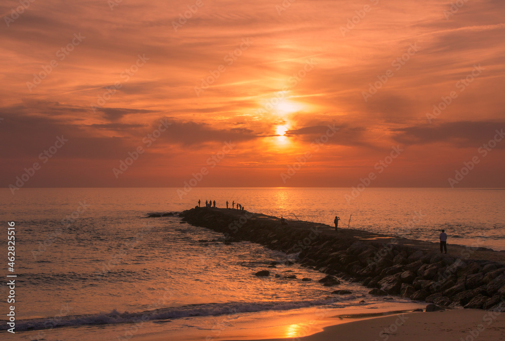 sunset on the beach in Costa de Caparica, Portugal