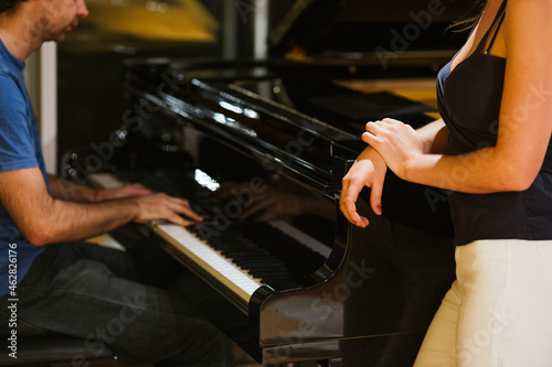 Singer and pianist in recording studio