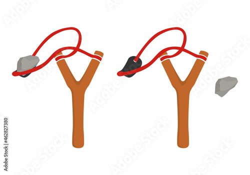 Wooden slingshot with flying stone