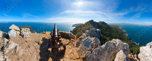 Spain, Balearic Islands, Mallorca, Peninsula Alcudia, Penya del Migdia, View to Alcudia and Pollenca, cannon photo