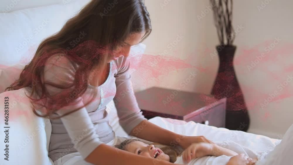 Animation of moving red network of connections over caucasian mother playing with baby girl Animation of moving red network of connections over caucasian mother playing with baby girl