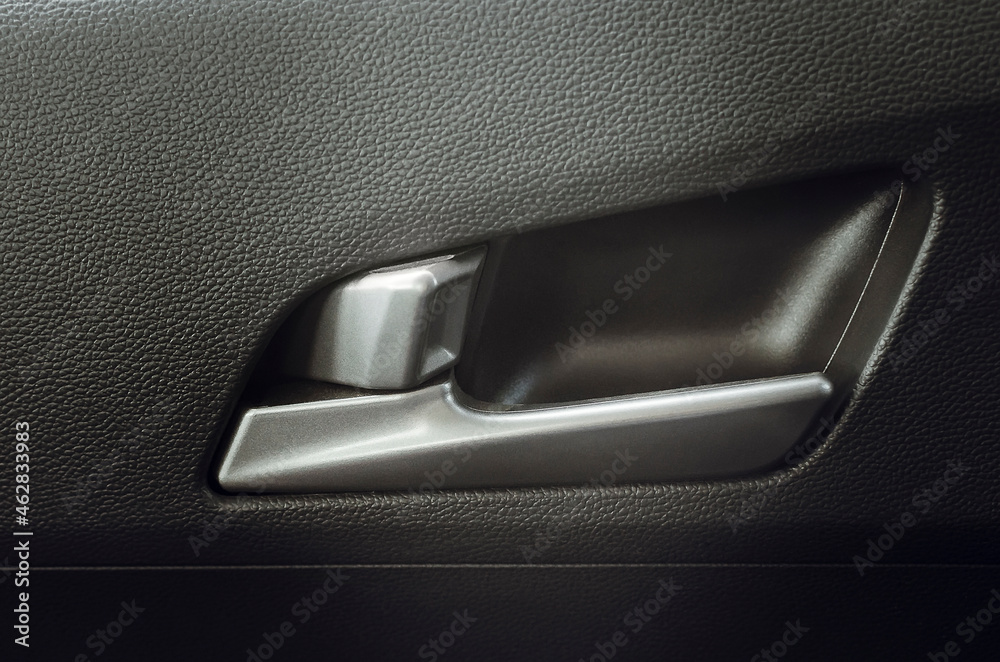Car interior details of door handle.