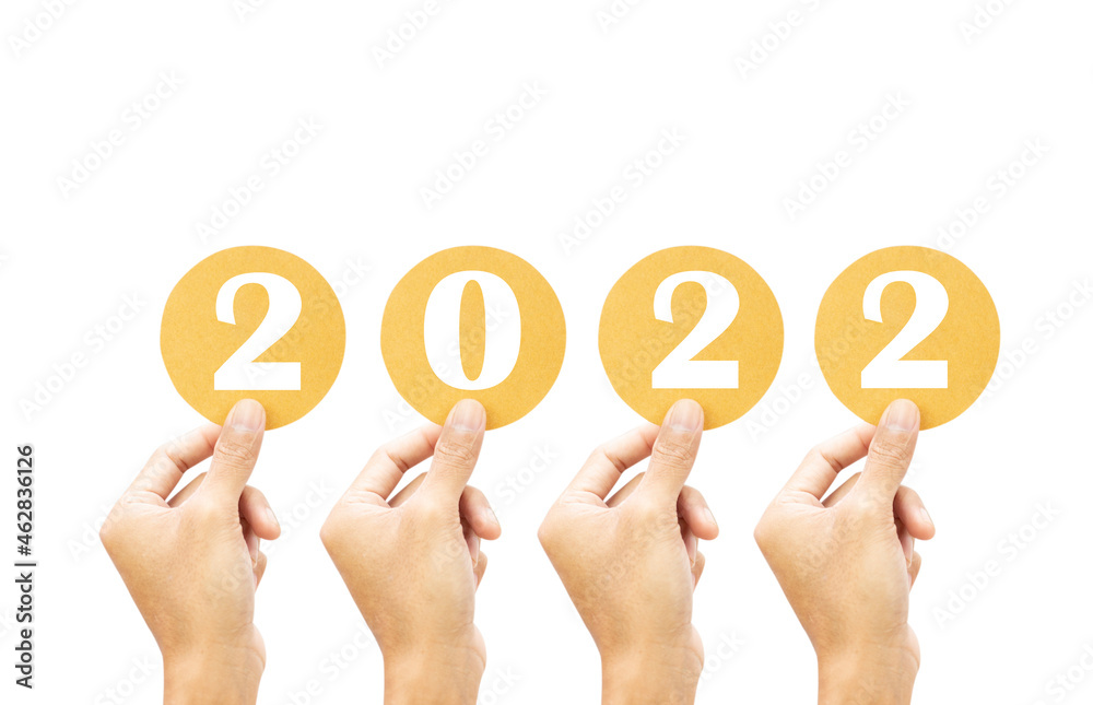 Hand holding paper cut with number 2022 isolated on white background, Happy New year 2022 design background concept Hand holding paper cut with number 2022 isolated on white background, Happy New year 2022 design background concept
