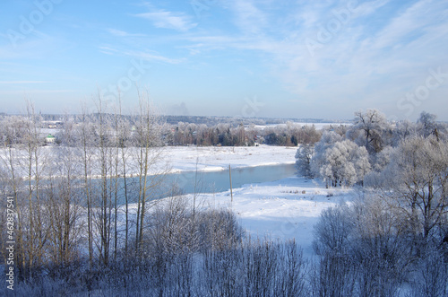 Mozhaisk, Russia - February, 2021: Winter view of the Moscow River and Ilyinskaya Sloboda