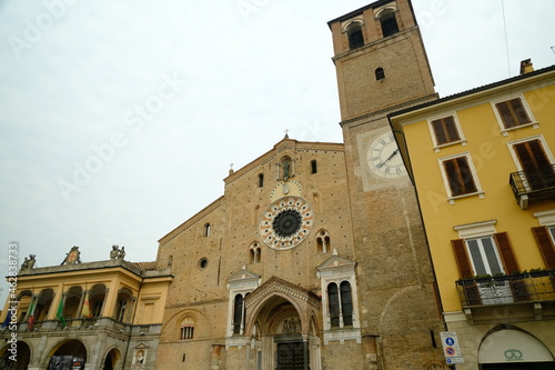 Lodi Cathedral. Cathedral of Lodi, façade in terracotta bricks.Exterior of the large church made of terracotta bricks in the Romanesque style. 