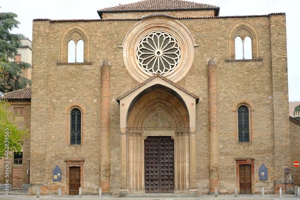 Windows to the sky. Windows on medieval church sky.Romanesque church of San Francesco with a terracotta brick facade. 