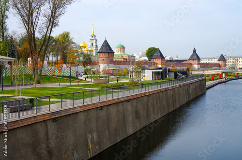 Tula, Russia - October 2020: Kazanskaya embankment near the Tula Kremlin with a view of the canal in an autumn day