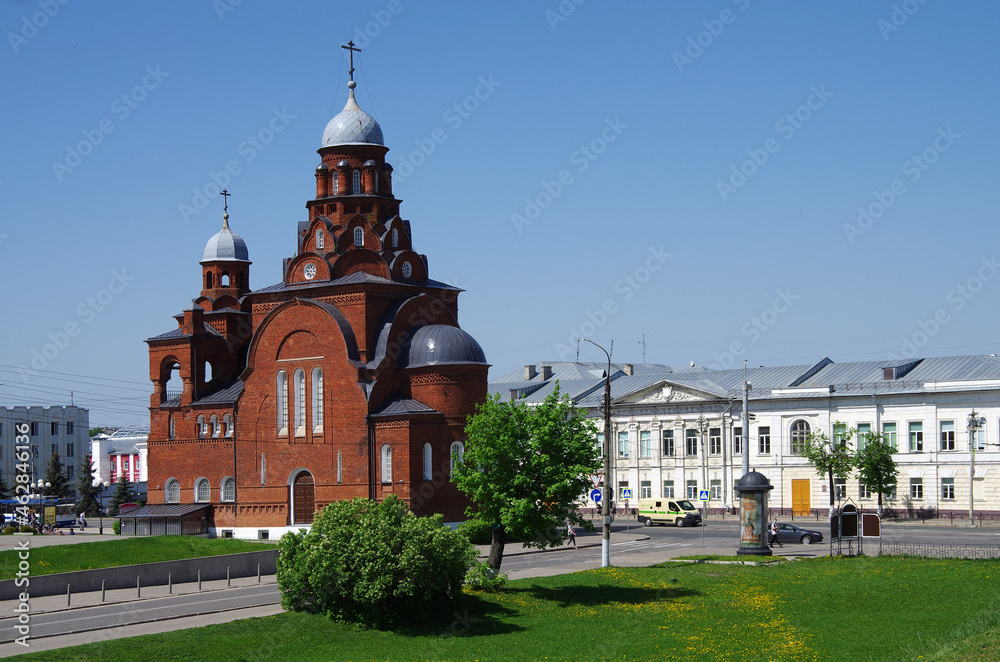 Vladimir, Russia - May, 2021: Ancient city street in spring sunny day. Trinity Church