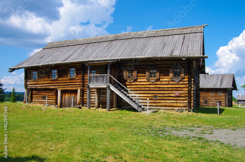 Kizhi, Karelia, Russia - July, 2021: Traditional northern wooden houses on the territory of the Kizhi Museum © Natalia Sidorova