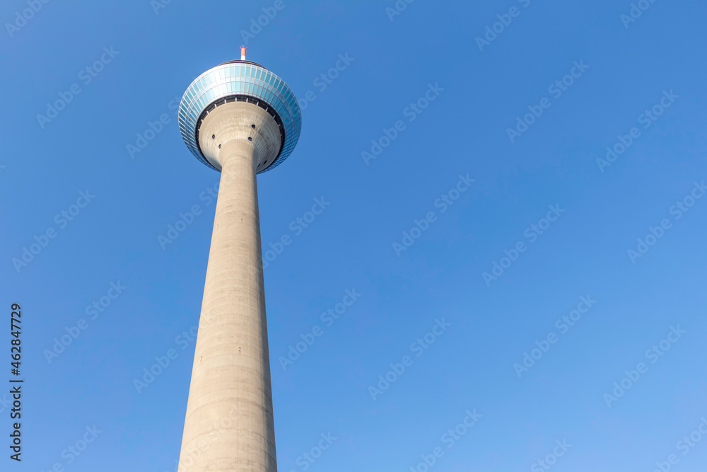 Germany, North Rhine-Westfalia, Dusseldorf, Rhine Tower standing against clear blue sky Germany, North Rhine-Westfalia, Dusseldorf, Rhine Tower standing against clear blue sky