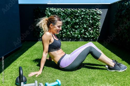 Woman during workout on terrace photo