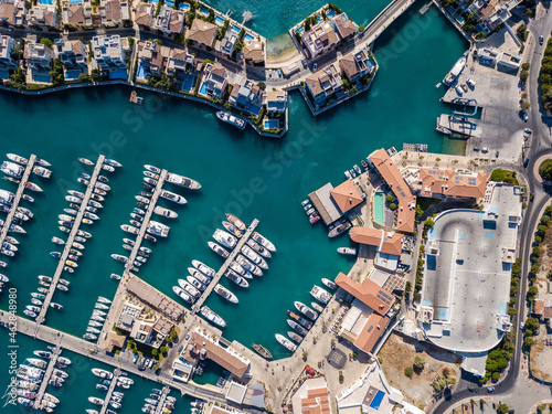 Aerial shot from drone of marina port with yachts and sailboats