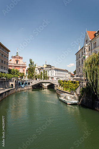 Slovenia, Ljubljana, Old town with Tromostovje (Triple Bridge) over Ljubljanica river photo