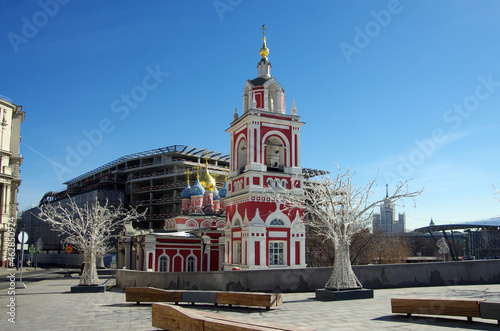 Moscow, Russia - March, 2021: Bell tower and Church of St. George on Pskov hill in the landscape Park " Zaryadye"