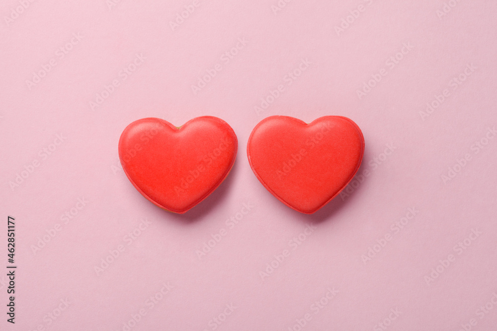 Two heart shaped cakes on pastel pink background, love, marriage concept, Valentines day card