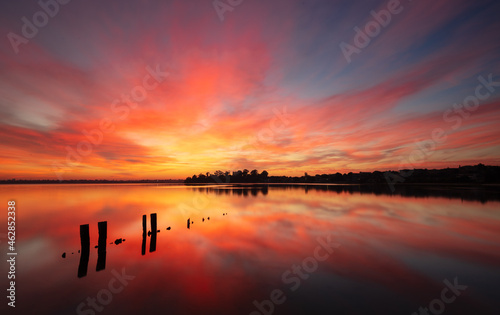 Morning sunrise at the Applecross Foreshore looking across to Heathcote Pt. with the remains of the old Applecross Jetty in the foreground ... Swan River, Perth Western Australia.