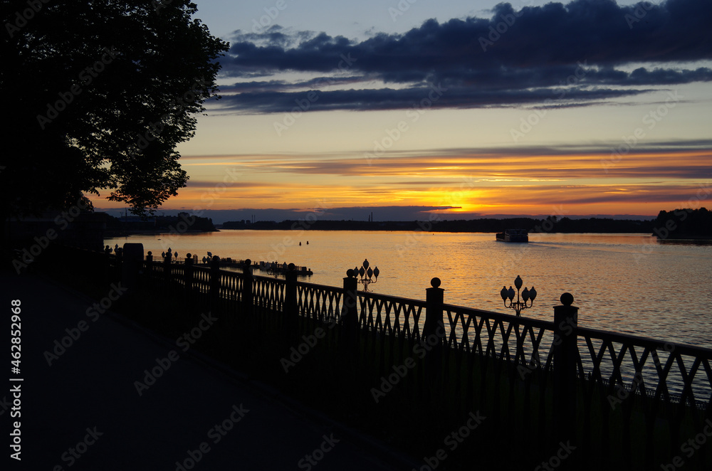 Rybinsk, Russia - May, 2021: Evening view of the embankment of the Volga river