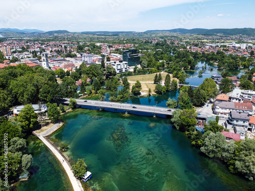 Aerial drone view Bihac and Una river in Bosnia and Herzegovina. Buildings, streets and residential houses. Bihać is a town and municipality in western BiH.