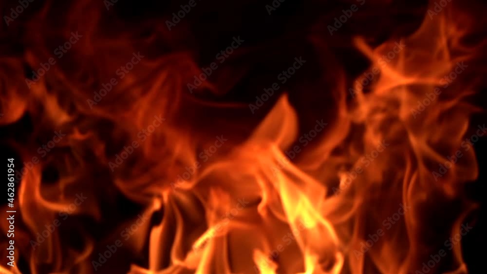 Fire flames in super slow motion isolated on black background