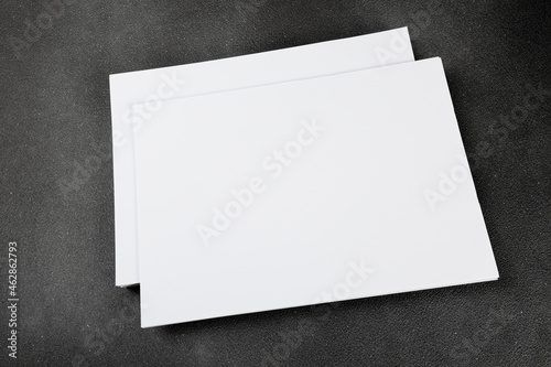 Blank a4 poster flyer isolated on gray to replace your mockup design