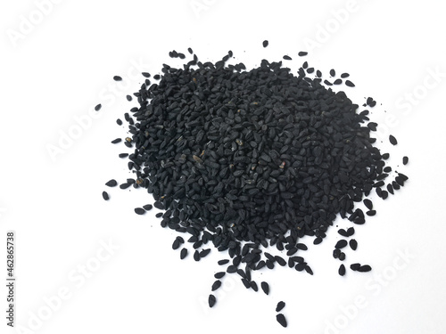 Black seed, black cumin or nigella sativa on a white background with space for your text
