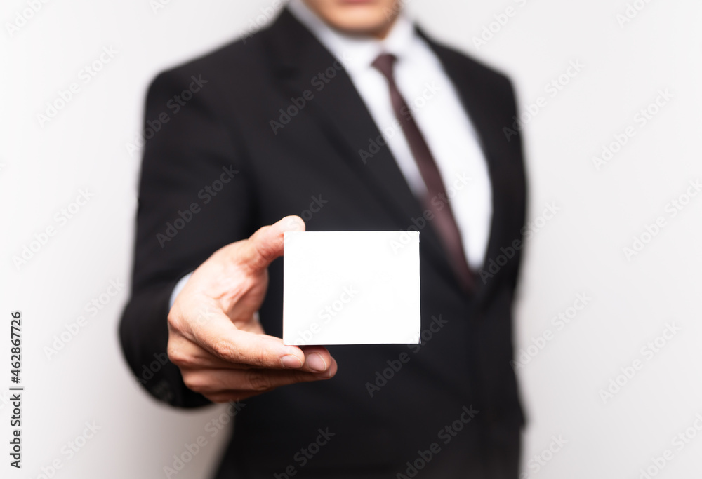businessman holding a business card businessman holding a business card