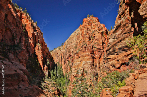 Steep walls of rocky mountains of Zion National park, Utah, Us