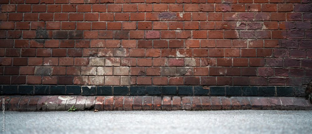 Brick wall background with ground Stock Photo | Adobe Stock