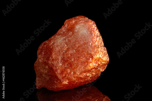 Macro mineral stone Nepheline sunny stone black background photo