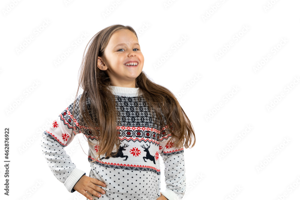 portrait of laughing, dancing girl in white knitted Christmas sweater with reindeer rejoicing at the approach of holidays, isolated on white background with copy space. portrait of laughing, dancing girl in white knitted Christmas sweater with reindeer rejoicing at the approach of holidays, isolated on white background with copy space.