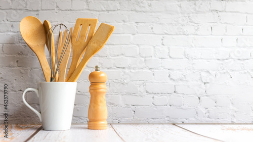Obraz na plátne Kitchen tools and kitchenware utensil object with ingredients on kitchen shelf wood white for healthy eat and health care life