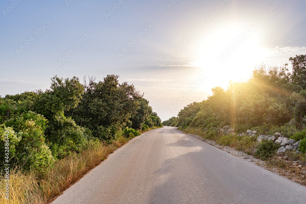 Scenic road. The road is surrounded by a magnificent natural landscape. Scenic road. The road is surrounded by a magnificent natural landscape.