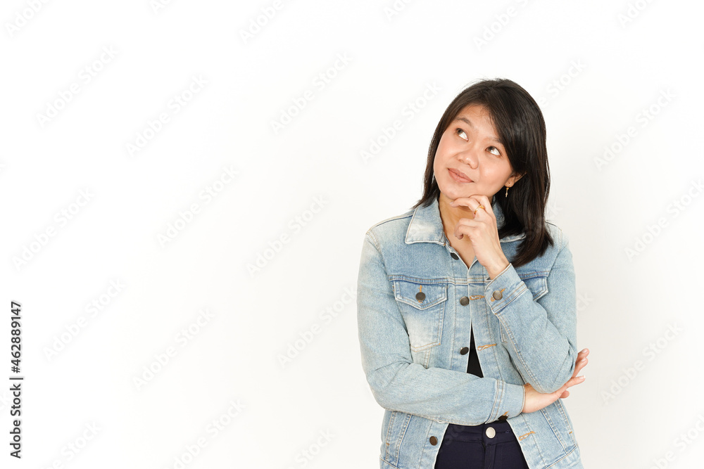 Thinking of Beautiful Asian Woman Wearing Jeans Jacket and black shirt Isolated On White Background Thinking of Beautiful Asian Woman Wearing Jeans Jacket and black shirt Isolated On White Background