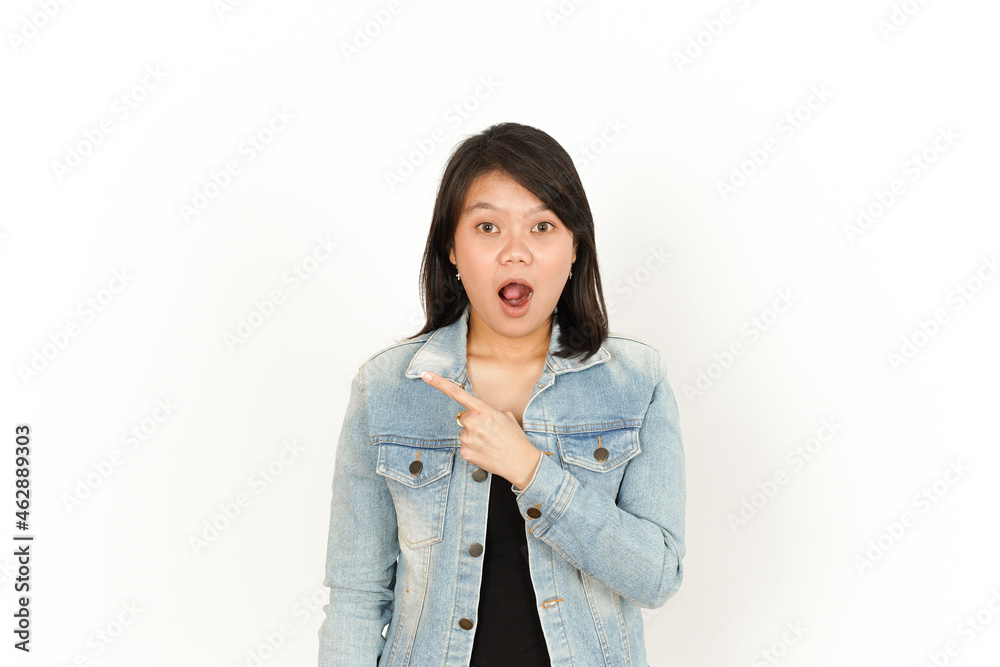 Showing and Pointing Left Side of Beautiful Asian Woman Wearing Jeans Jacket and black shirt Isolated On White Background Showing and Pointing Left Side of Beautiful Asian Woman Wearing Jeans Jacket and black shirt Isolated On White Background